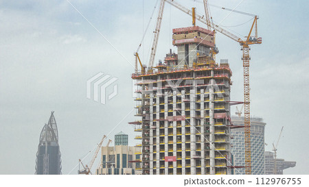 Construction site in Dubai timelapse, United Arab Emirates 112976755