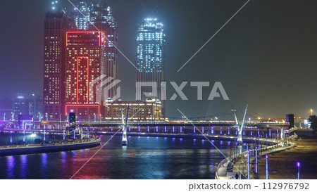 The new Dubai Water Canal with view on the city skyline timelapse, United Arab Emirates The new Dubai Water Canal with view on the city skyline timelapse, United Arab Emirates 112976792