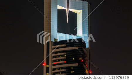 Downtown Dubai towers night timelapse. View of skyscrapers on Sheikh Zayed road. 112976859