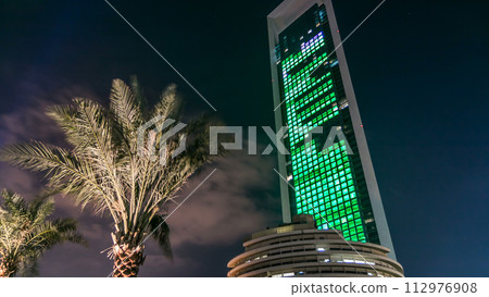 Famous towers buildings in Abu Dhabi night timelapse hyperlapse. Famous towers buildings in Abu Dhabi night timelapse hyperlapse. 112976908