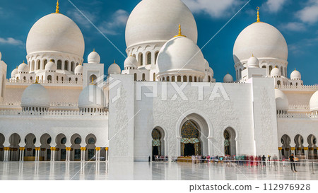 Sheikh Zayed Grand Mosque timelapse located in Abu Dhabi - capital city of United Arab Emirates. Sheikh Zayed Grand Mosque timelapse located in Abu Dhabi - capital city of United Arab Emirates. 112976928