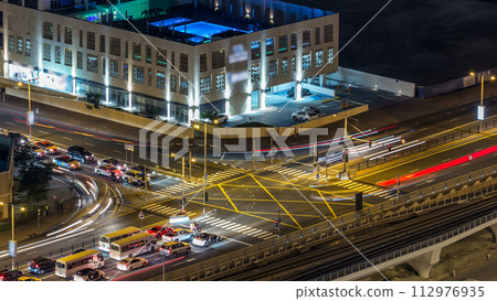 Aerial top view at night timelapse of Dubai Marina and JBR in Dubai, UAE 112976935
