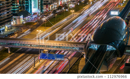 Metro Station with traffic on the highway timelapse in Dubai, UAE. 112976966