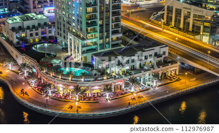 Aerial top view at night timelapse of Dubai Marina in Dubai, UAE 112976987