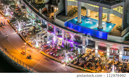 Aerial top view at night timelapse of Dubai Marina in Dubai, UAE 112976992