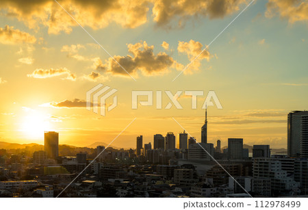 Beautiful sunsets at Momochihama, Jigyohama, and Fukuoka Tower in Sawara Ward. Emphasis on sunlight. 112978499