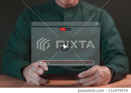 Fans football using a computer laptop for watching live football or soccer streaming online on virtual screen, searching video on internet, concept of sport content online.. 112979554