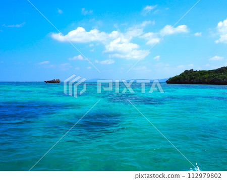 The scenery of Kabira Bay with its beautiful emerald green sea The scenery of Kabira Bay with its beautiful emerald green sea 112979802