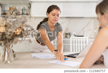 Girl agent communicates with client and makes deal with him Girl agent communicates with client and makes deal with him 112980757