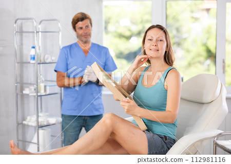 Adult woman satisfied with result of cosmetic procedure Adult woman satisfied with result of cosmetic procedure 112981116