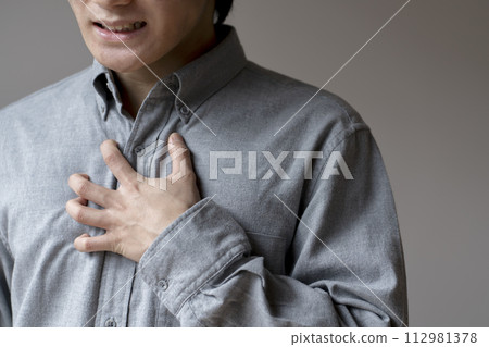 Man in poor health, chest pain, stress, body parts, parts cut Man in poor health, chest pain, stress, body parts, parts cut 112981378