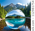 Water globe reflecting nature 112981754