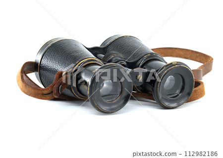 Binoculars with brown leather straps isolated on white Binoculars with brown leather straps isolated on white 112982186
