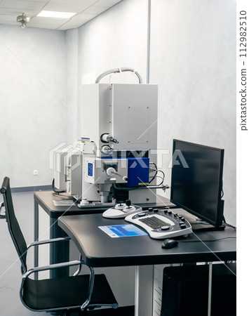 Work space of a scientist with Electron microscope, table and computer Work space of a scientist with Electron microscope, table and computer 112982510