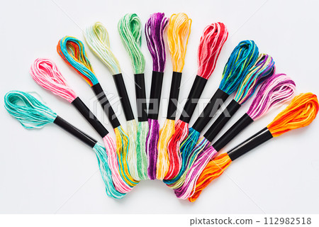 Many skeins of mouline thread for embroidery melange background Many skeins of mouline thread for embroidery melange background 112982518