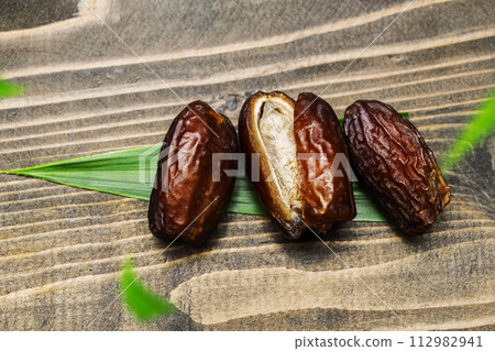 Dried dates fruit for iftar on Ramadan 112982941