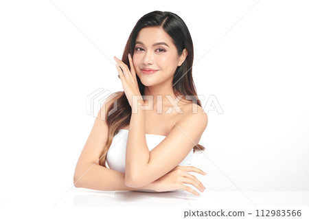 Beautiful young asian woman with clean fresh skin on white background, Face care, Facial treatment, Cosmetology, beauty and spa, Asian women portrait. Beautiful young asian woman with clean fresh skin on white background, Face care, Facial treatment, Cosmetology, beauty and spa, Asian women portrait. 112983566
