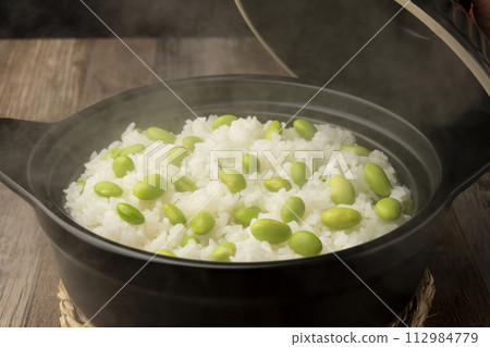 Edamame rice cooked in earthen pot Edamame rice cooked in earthen pot 112984779