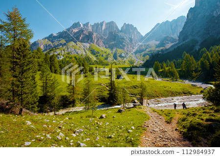 landscape with mountains, rocks, trees and trail landscape with mountains, rocks, trees and trail 112984937