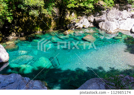 Niyodo Blue in Yasui Valley seen in summer in Kochi Prefecture Niyodo Blue in Yasui Valley seen in summer in Kochi Prefecture 112985174