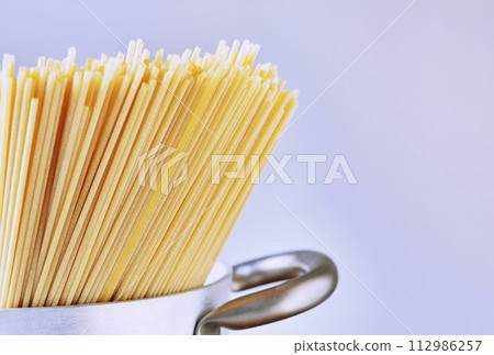 Preparing pasta spaghetti 112986257