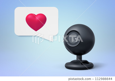 Webcam with a heart symbol in a speech bubble 112986644