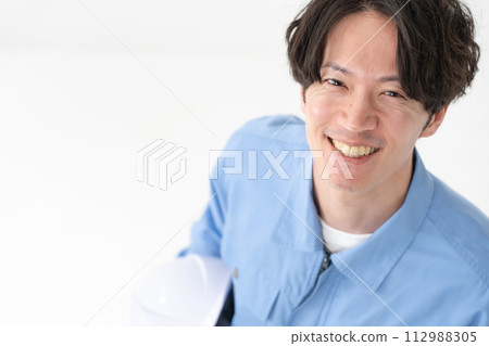 Man in work clothes overhead view 112988305