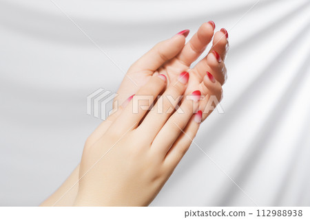 Beautiful Woman Hands. Female Hands Applying Cream Beautiful Woman Hands. Female Hands Applying Cream 112988938