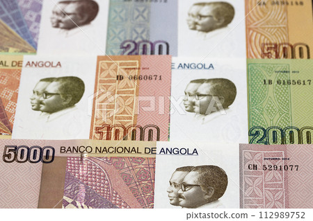 Angolan kwanza a business background Angolan kwanza a business background 112989752