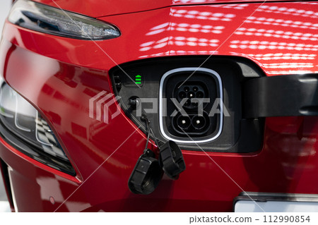 Close up of an electric car inlet Close up of an electric car inlet 112990854