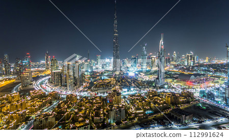 Dubai Downtown at night timelapse view from the top in Dubai, United Arab Emirates Dubai Downtown at night timelapse view from the top in Dubai, United Arab Emirates 112991624