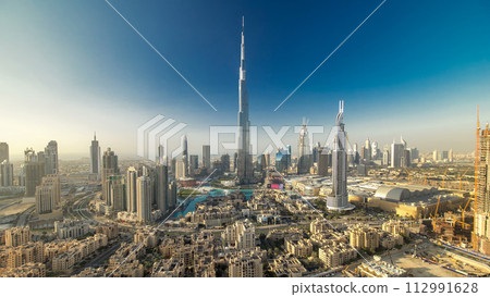 Dubai Downtown at evening timelapse view from the top in Dubai, United Arab Emirates 112991628