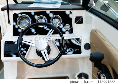 Cockpit of luxury yacht with dashboard. Cockpit of luxury yacht with dashboard. 112991822