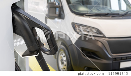 Electric delivery van with electric vehicles charging station 112991843