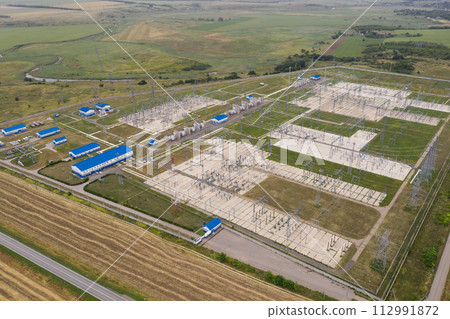 Aerial view of electrical power station. 112991872