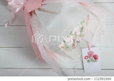 Marshmallow tulips. Marshmallow flowers. Bouquet of marshmallows. Homemade marshmallows. Greeting card with place for text. Shot from above. 112991984