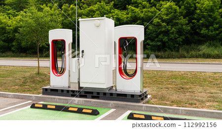 Electric car charging station on a street Electric car charging station on a street 112992156