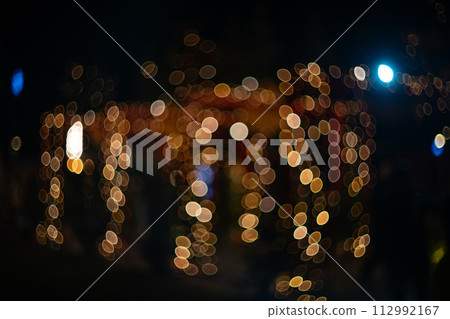 Blurred holiday background with bokeh. 112992167