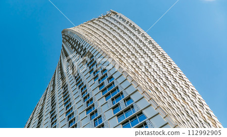 Cayan Tower timelapse known also as Infinity Tower in Dubai Marina. 112992905