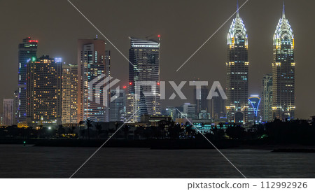 Dubai Internet City district panorama with towers timelapse. 112992926