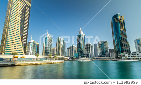 Dubai Marina modern towers in Dubai at day time timelapse Dubai Marina modern towers in Dubai at day time timelapse 112992959