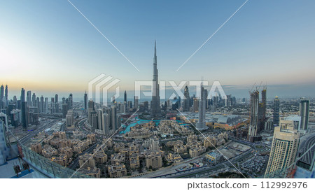 Dubai Downtown day to night timelapse view from the top in Dubai, United Arab Emirates 112992976