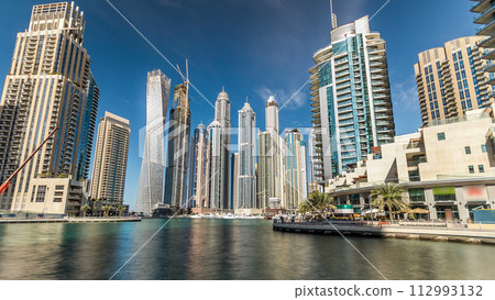 Dubai Marina towers in Dubai at day time timelapse hyperlapse Dubai Marina towers in Dubai at day time timelapse hyperlapse 112993132