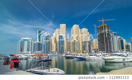 Dubai Marina towers in Dubai at day time timelapse hyperlapse 112993153