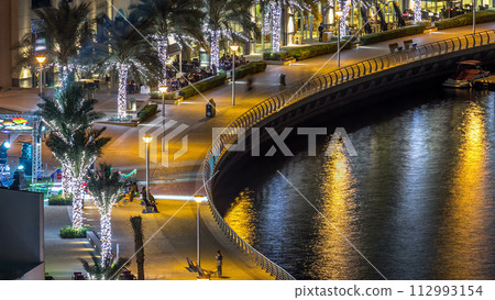 Promenade in Dubai Marina timelapse at night, UAE. Top view 112993154