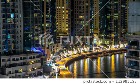 Promenade in Dubai Marina timelapse at night, UAE. Top view 112993155