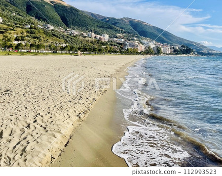 Summer cityscape of Vlore town. Adriatic sea, Albania. Summer cityscape of Vlore town. Adriatic sea, Albania. 112993523