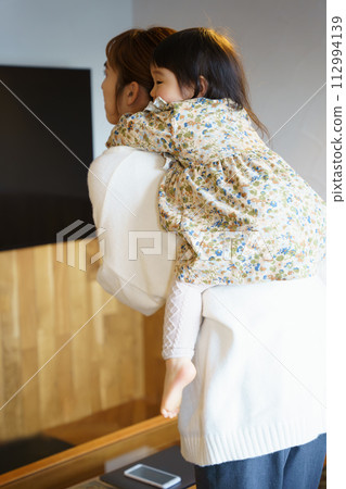mother taking care of her child mother taking care of her child 112994139