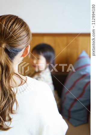 mother taking care of her child mother taking care of her child 112994180