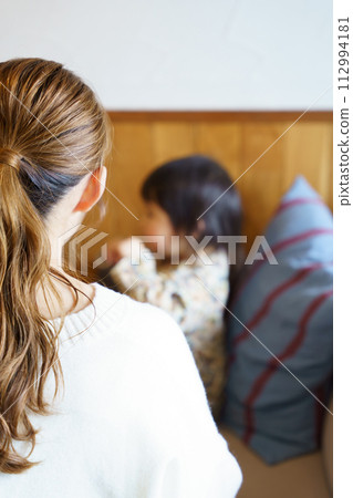 mother taking care of her child mother taking care of her child 112994181